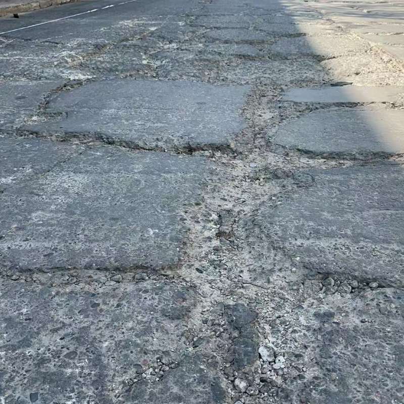 淅川路面起砂露石子修补料